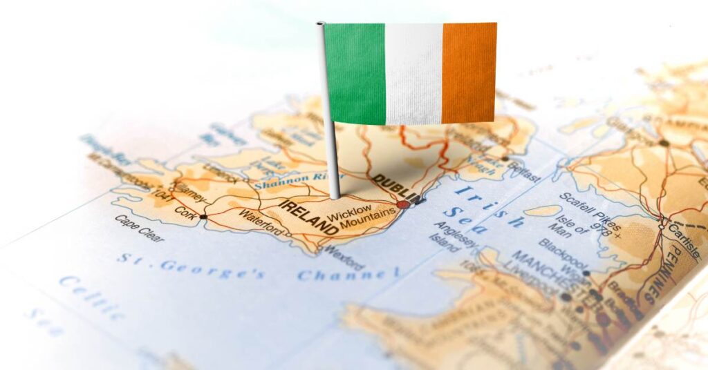 Irish flag pin on a map of Ireland highlighting Dublin and surrounding regions.